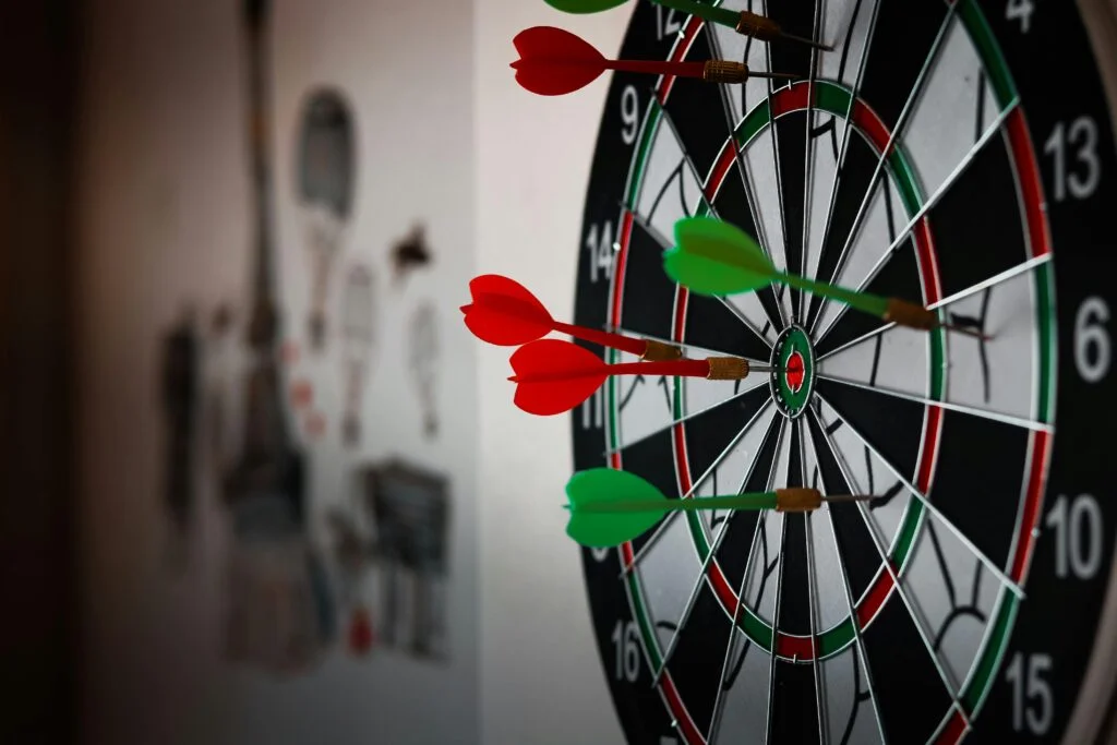 Close-Up Photo of Dart Pins on Dartboard